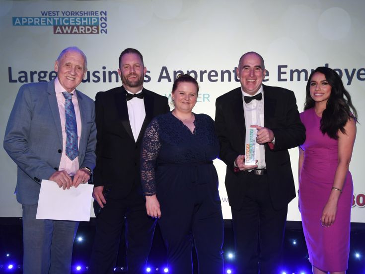 A group of people display their West Yorkshire Apprenticeship Award.