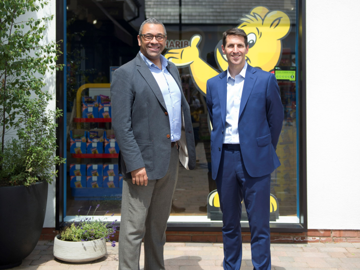 HARIBO UK Managing director and local MP pose in front of the HARIBO store.